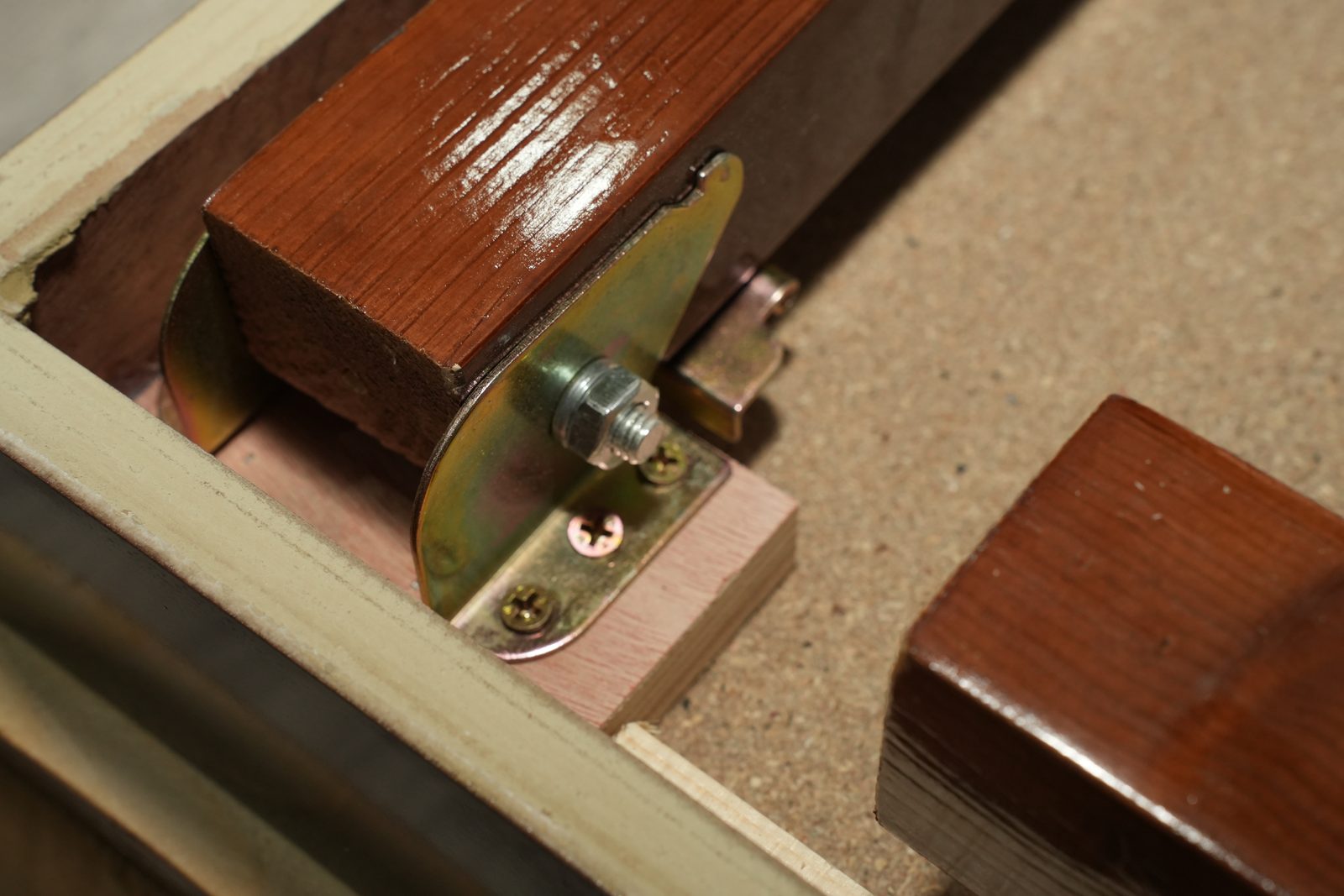 Hinge bracket with bolt close-up