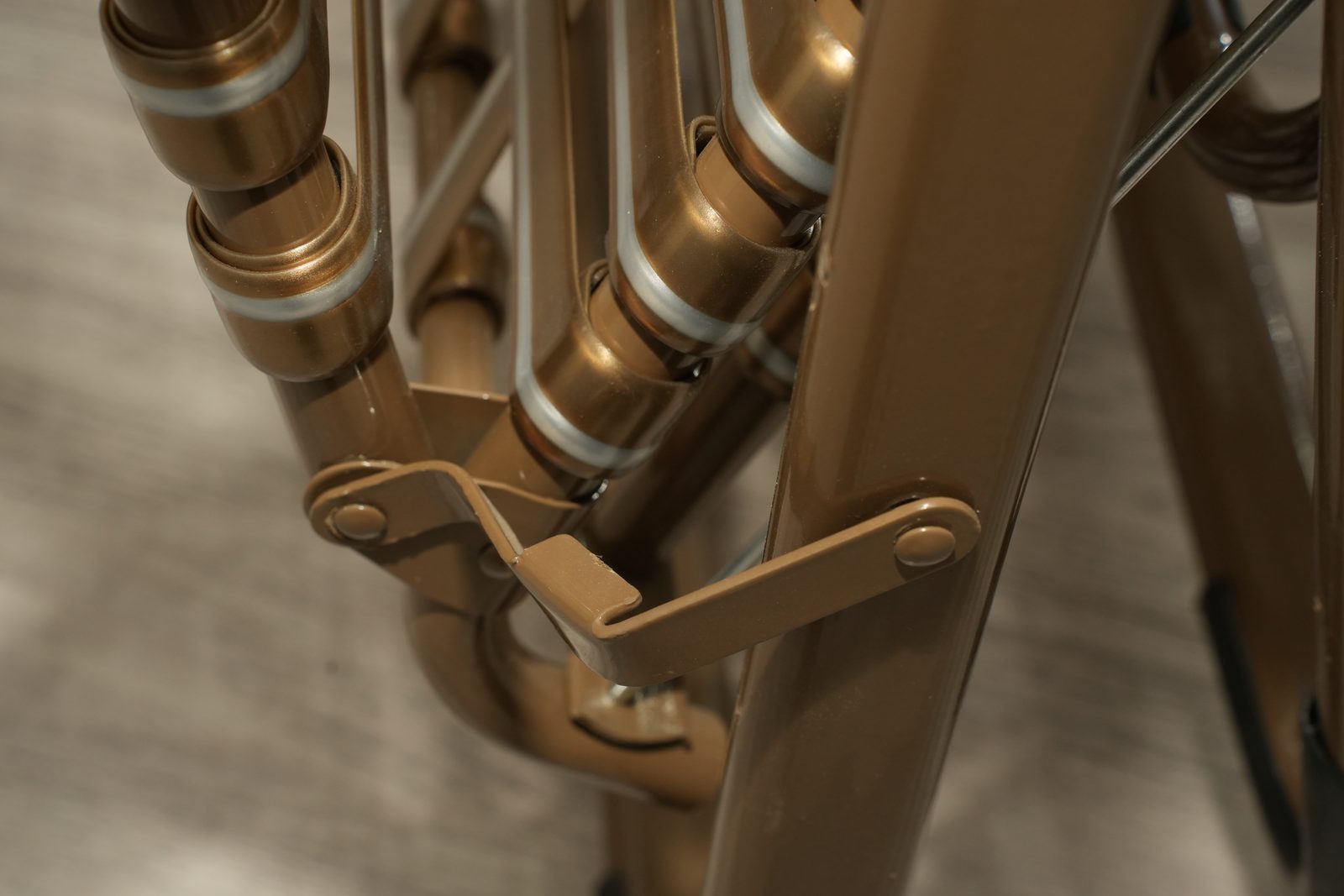 Folding linkage hardware close-up